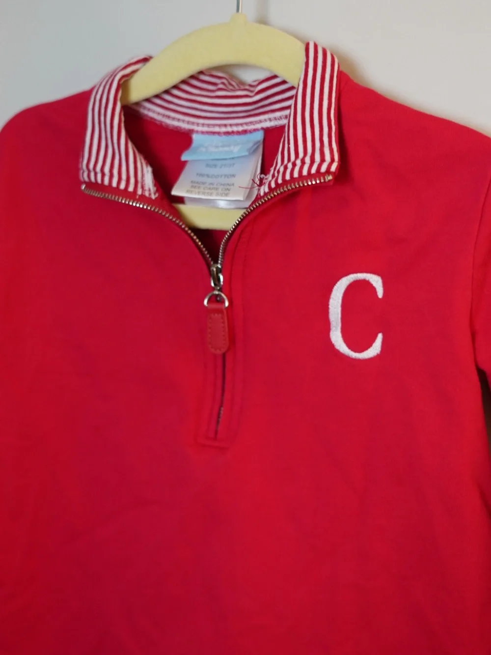 Classic Whimsy Red Quarter-Zip Top with Striped Collar and “C” monogram